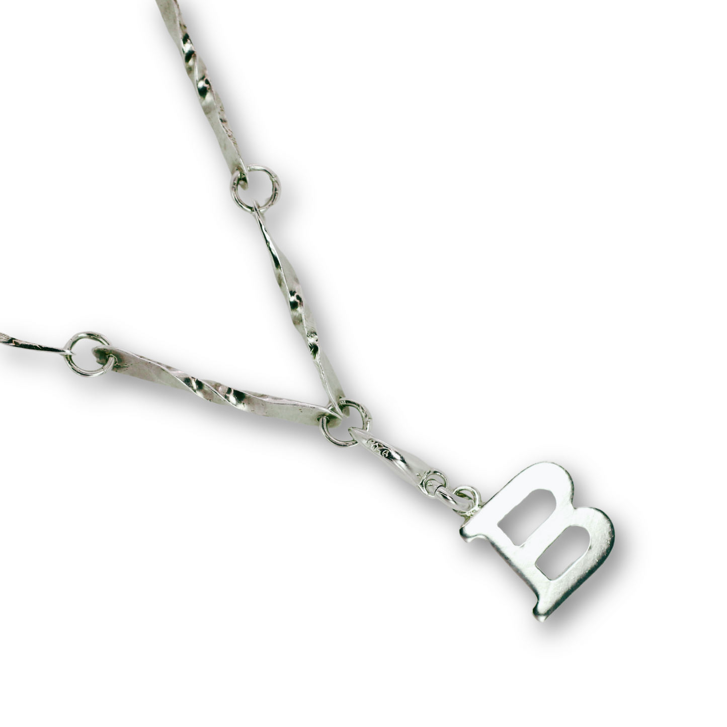 Handcrafted sterling silver letter B clip-on charm by Vijara jewelry.