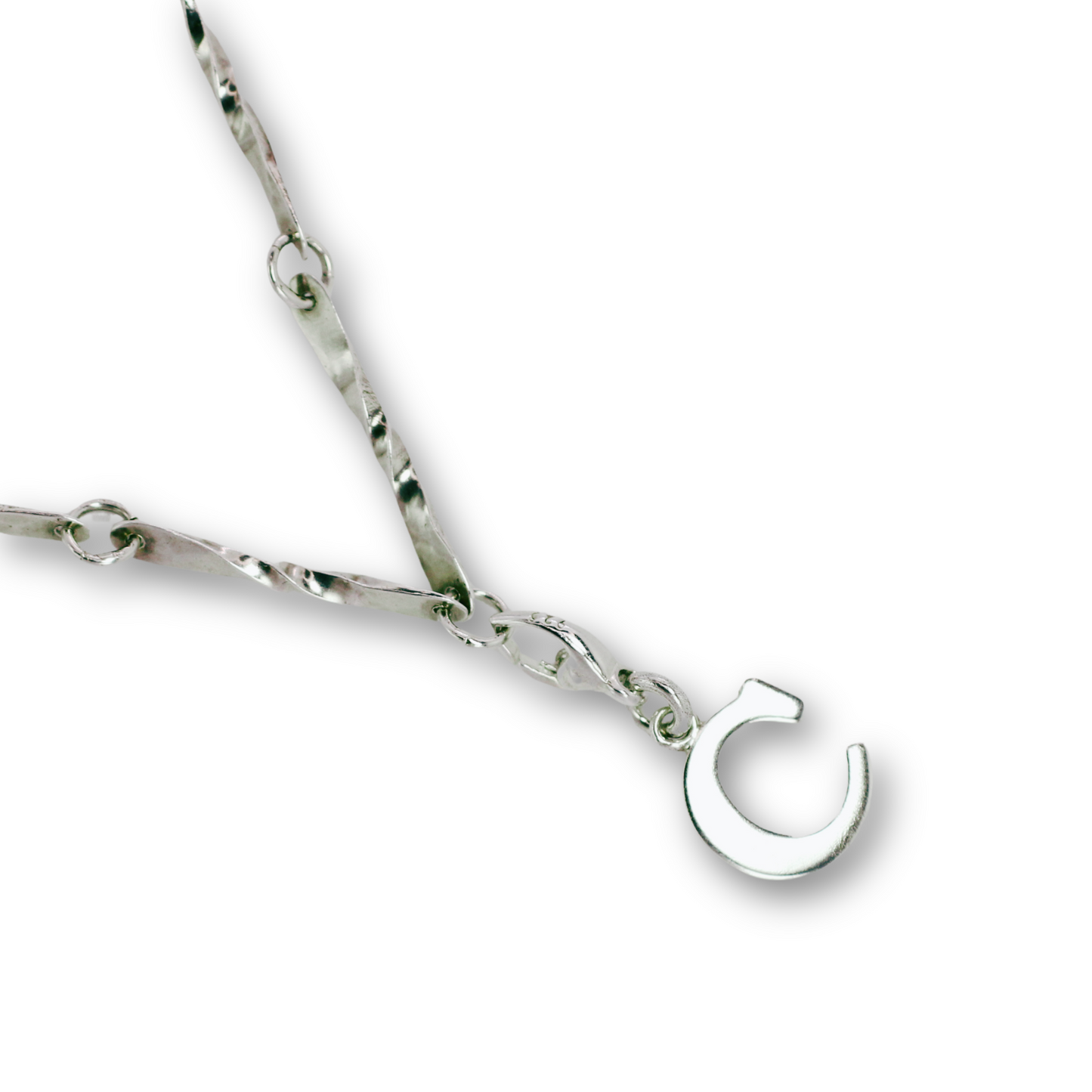 Handcrafted sterling silver letter C clip-on charm by Vijara jewelry.