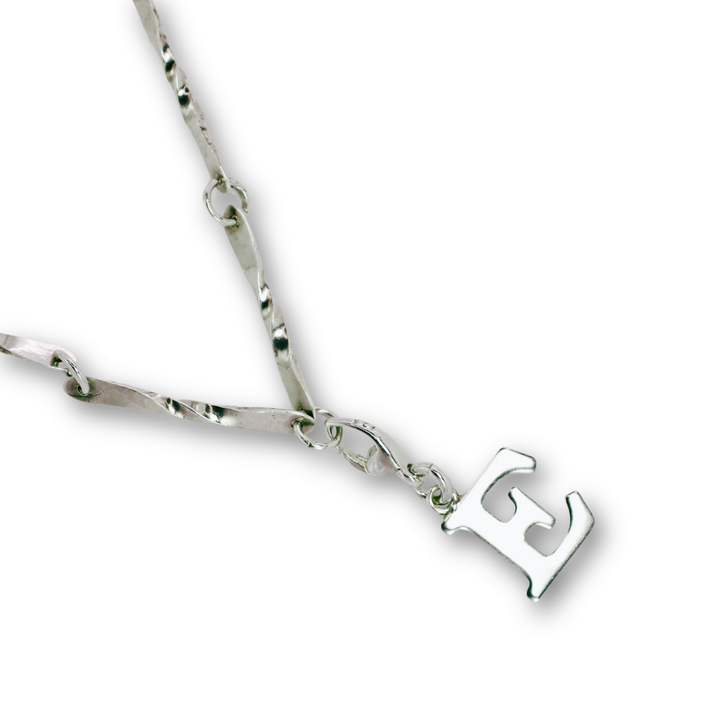 Handcrafted sterling silver letter E clip-on charm by Vijara jewelry.