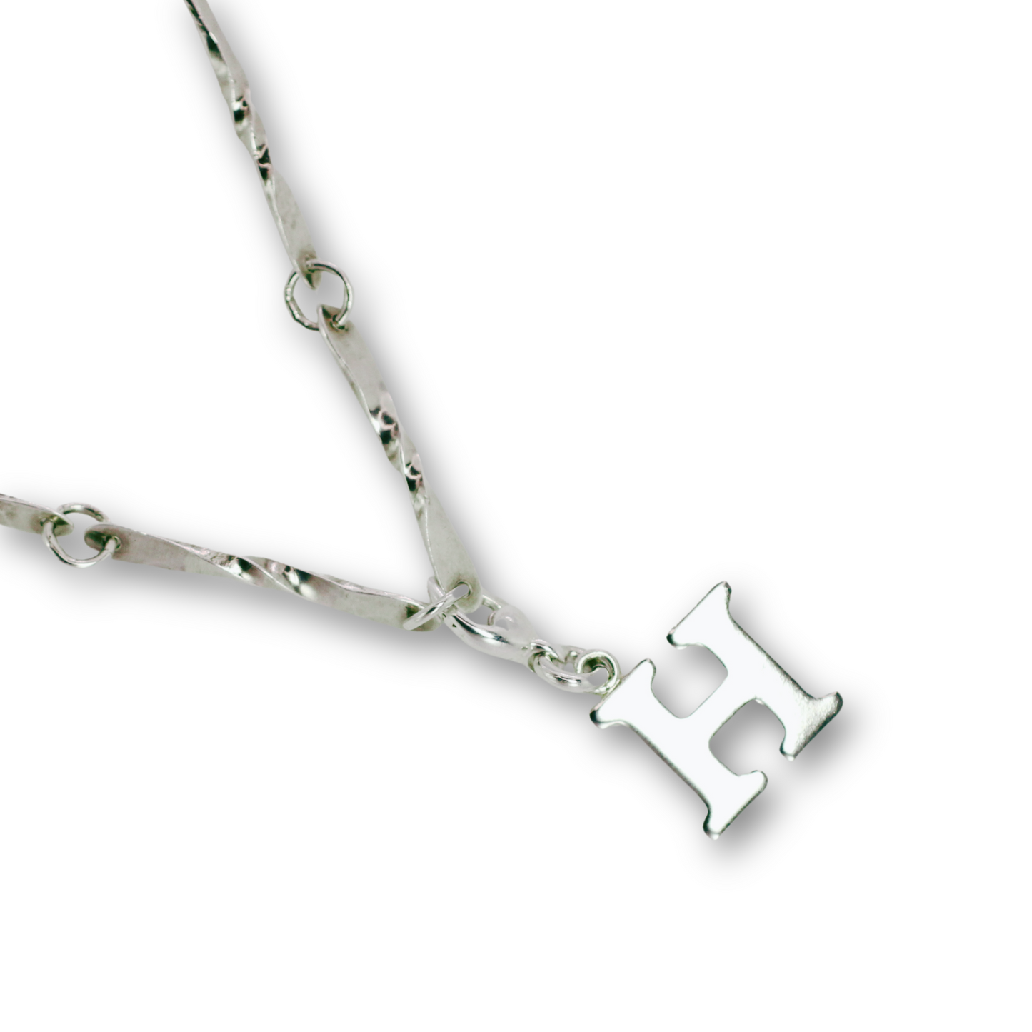 Handcrafted sterling silver letter H clip-on charm by Vijara jewelry.