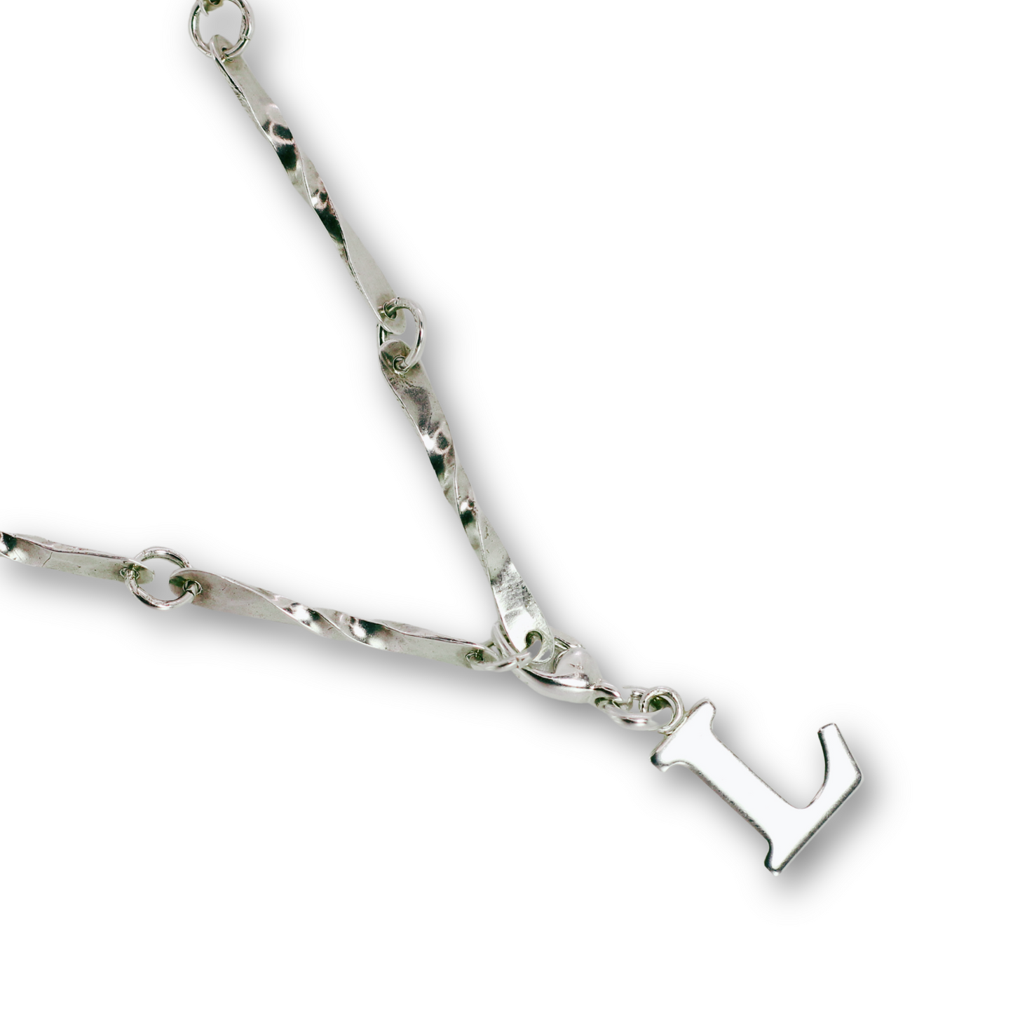 Handcrafted sterling silver letter L clip-on charm by Vijara jewelry.