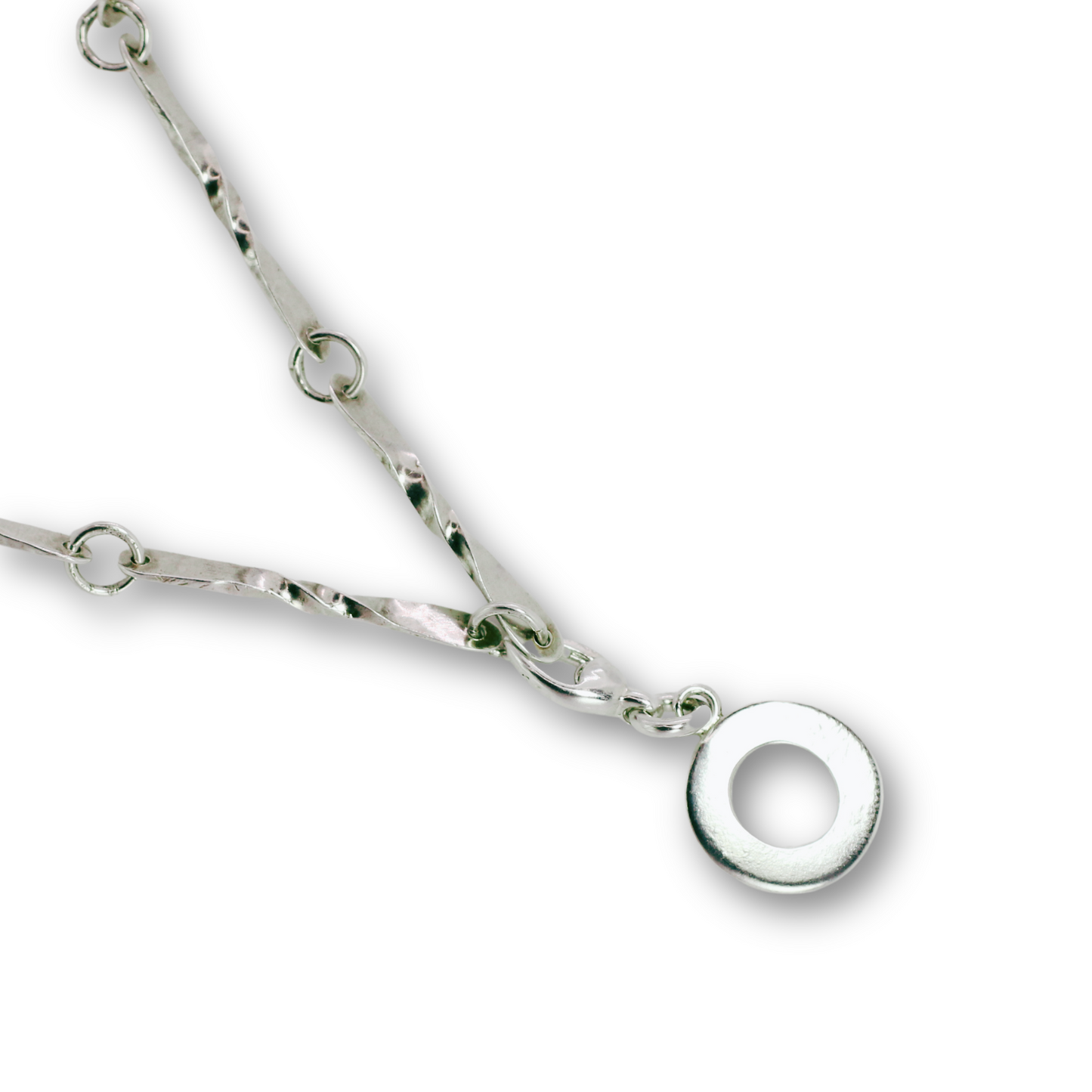 Handcrafted sterling silver letter O clip-on charm by Vijara jewelry.