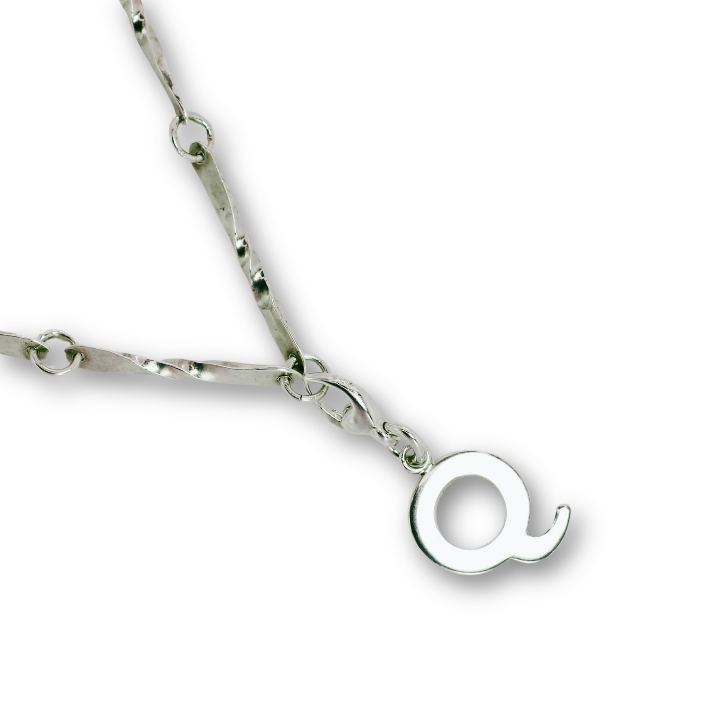 Handcrafted sterling silver letter Q clip-on charm by Vijara jewelry.