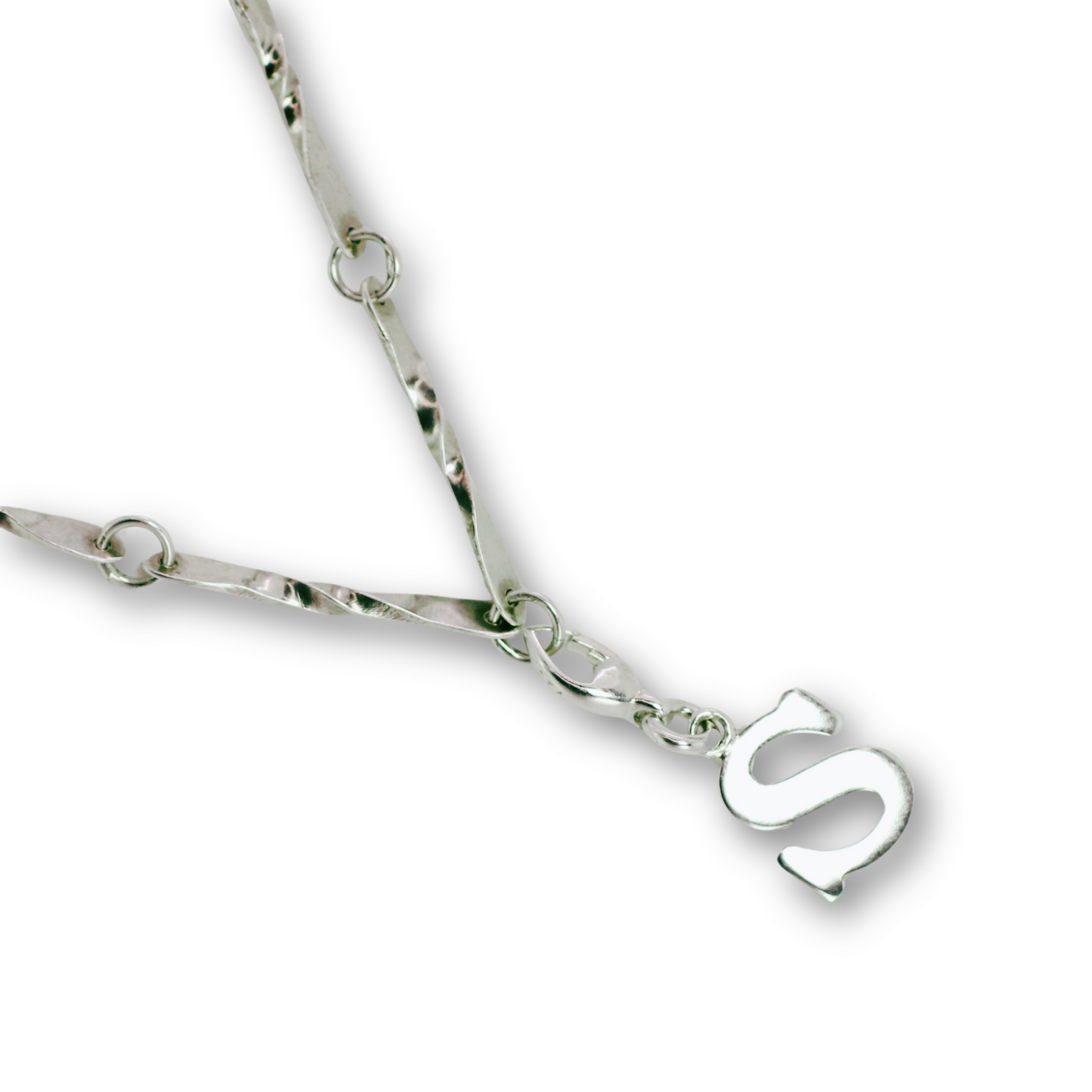 Handcrafted sterling silver letter S clip-on charm by Vijara jewelry.