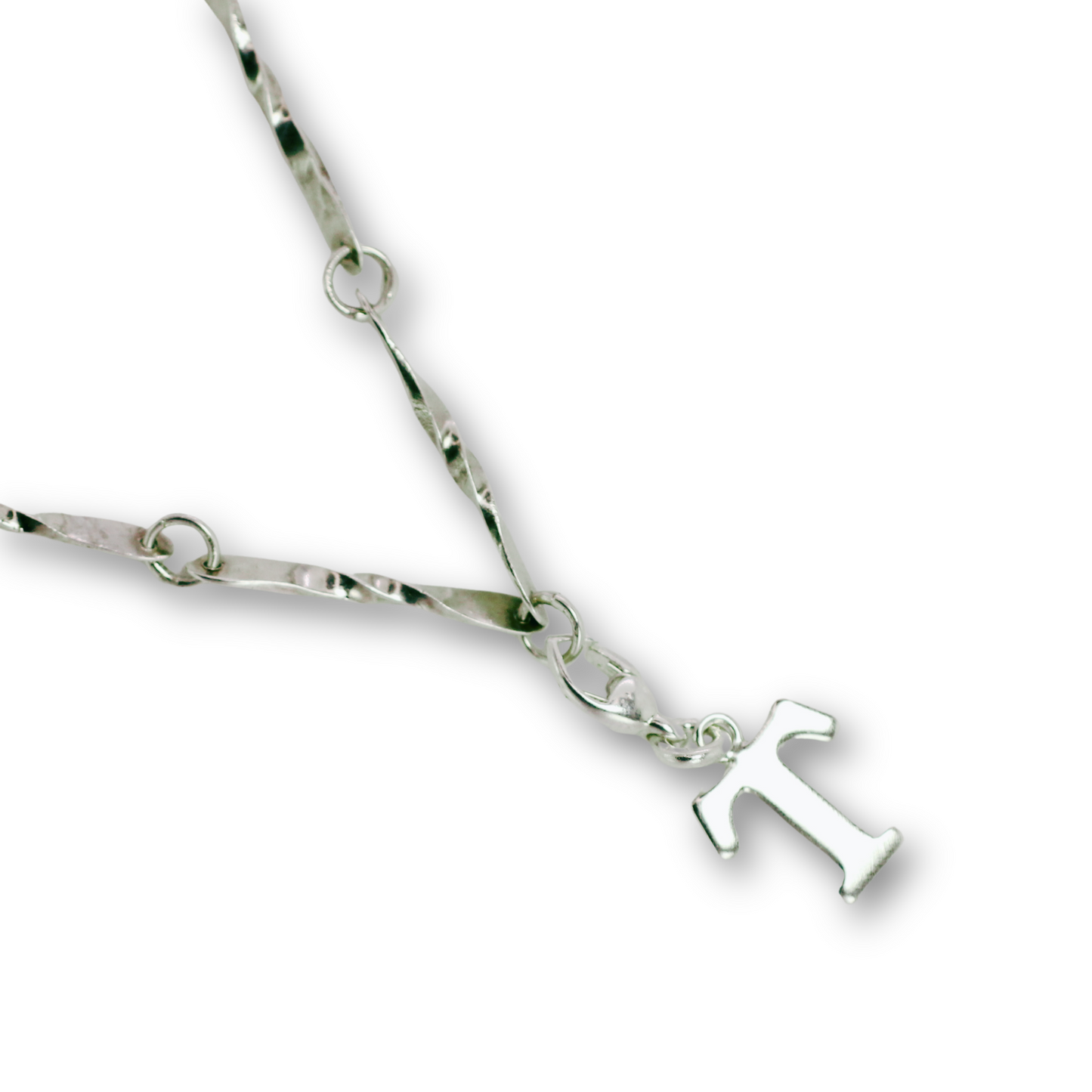 Handcrafted sterling silver letter T clip-on charm by Vijara jewelry.