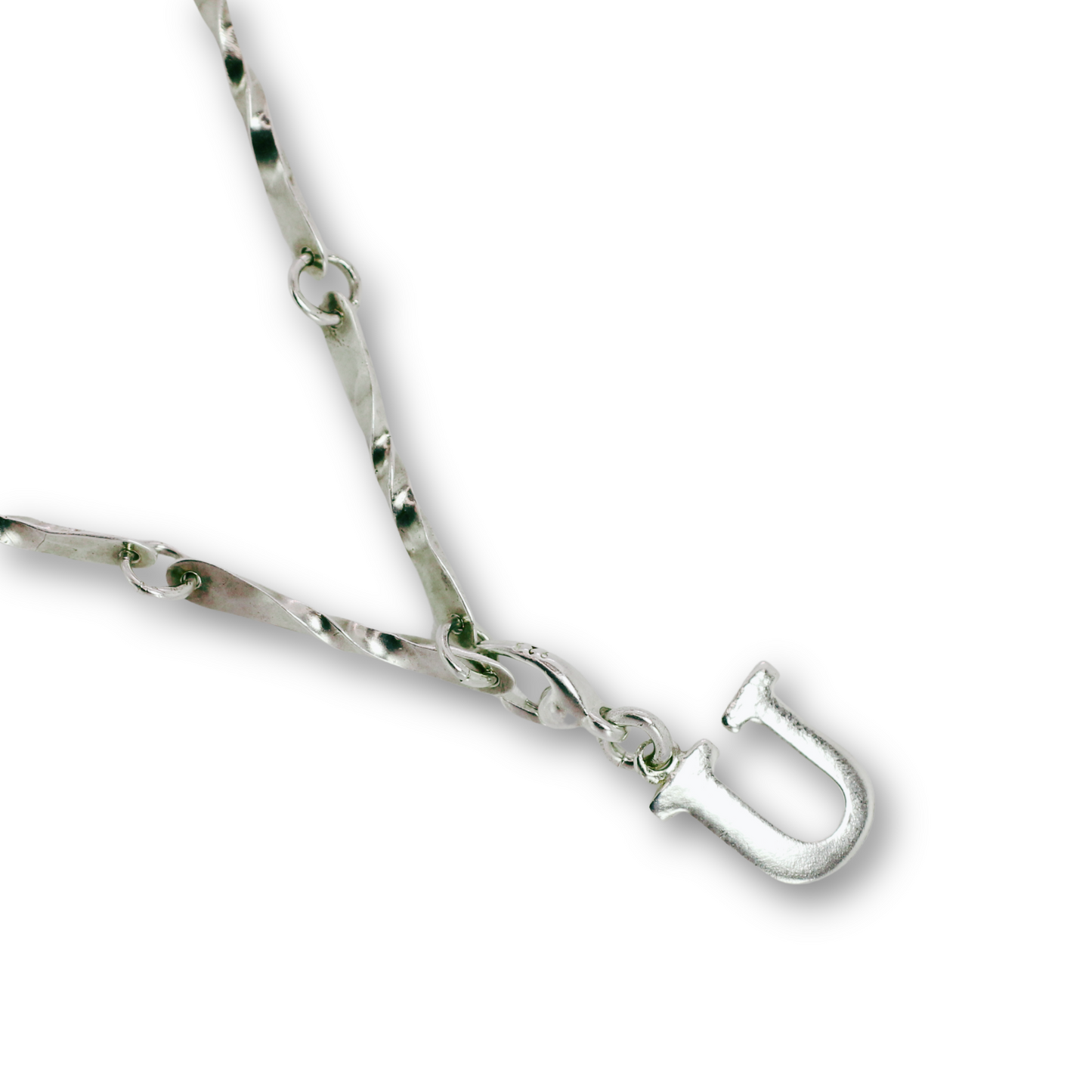 Handcrafted sterling silver letter U clip-on charm by Vijara jewelry.