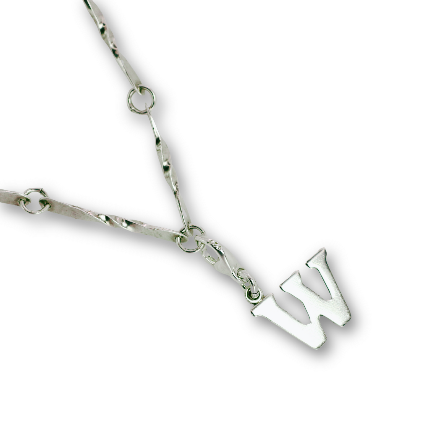 Handcrafted sterling silver letter W clip-on charm by Vijara jewelry.