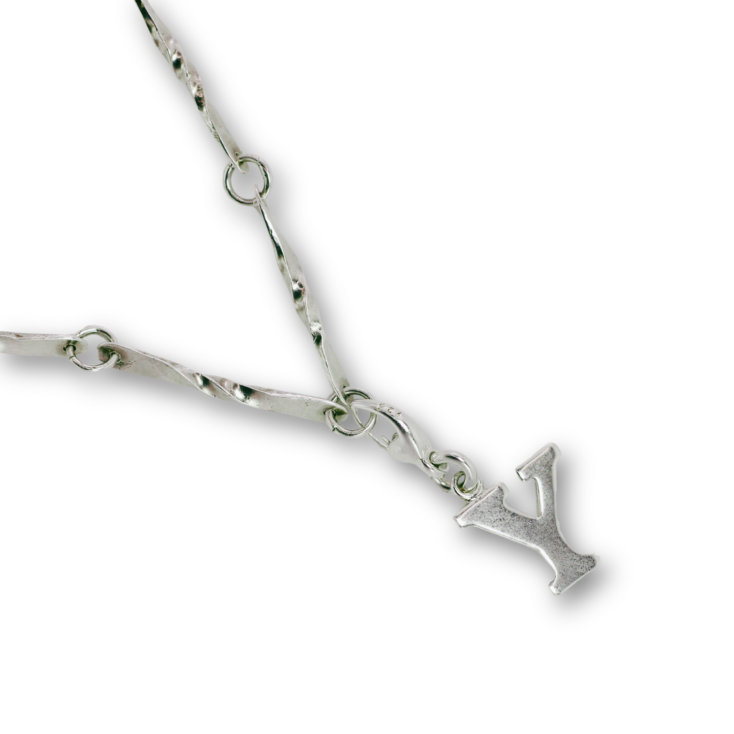 Handcrafted sterling silver letter Y clip-on charm by Vijara jewelry.