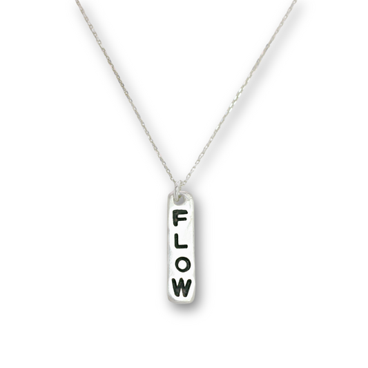 Handcrafted recycled fine silver "flow" word charm necklace by Vijara jewelry.