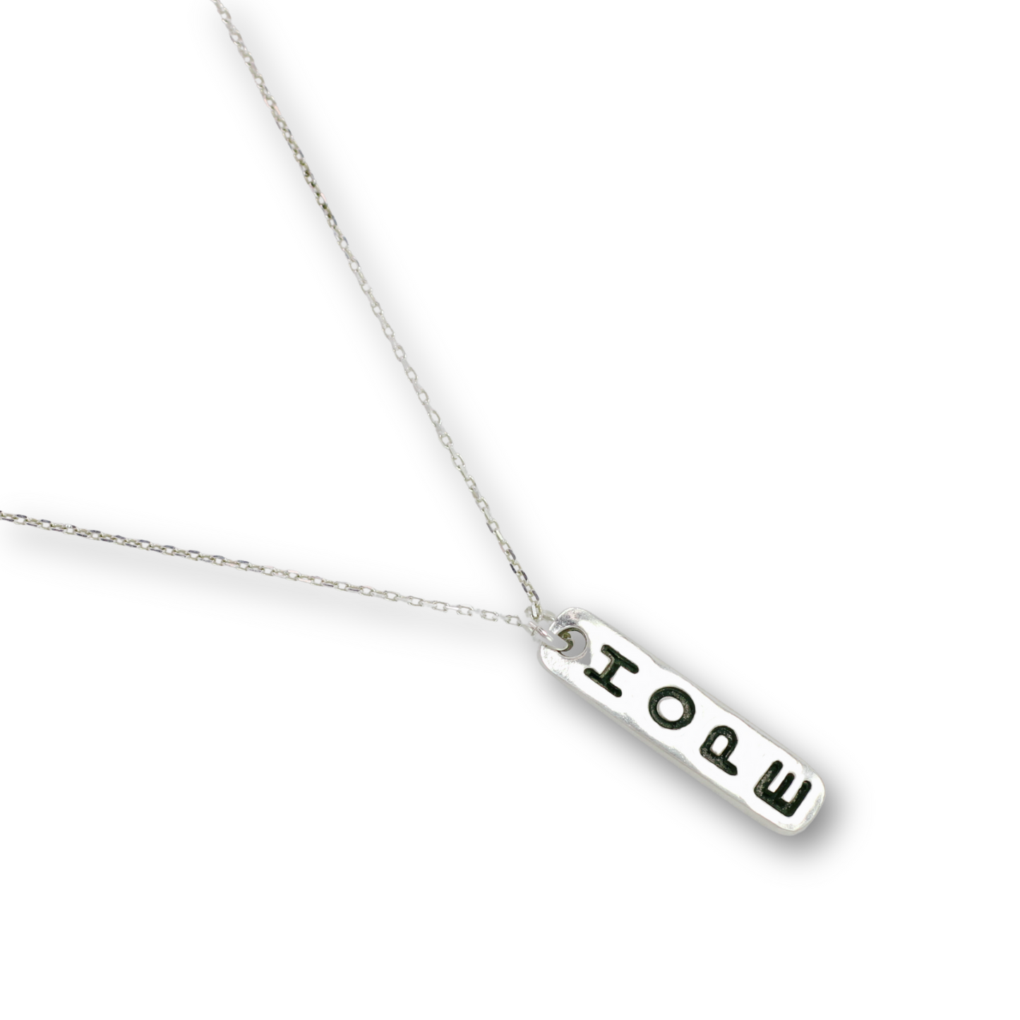 Handcrafted recycled fine silver "hope" word charm necklace by Vijara jewelry.