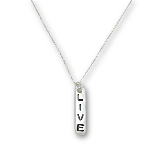 Handcrafted recycled fine silver "live" word charm necklace by Vijara jewelry.
