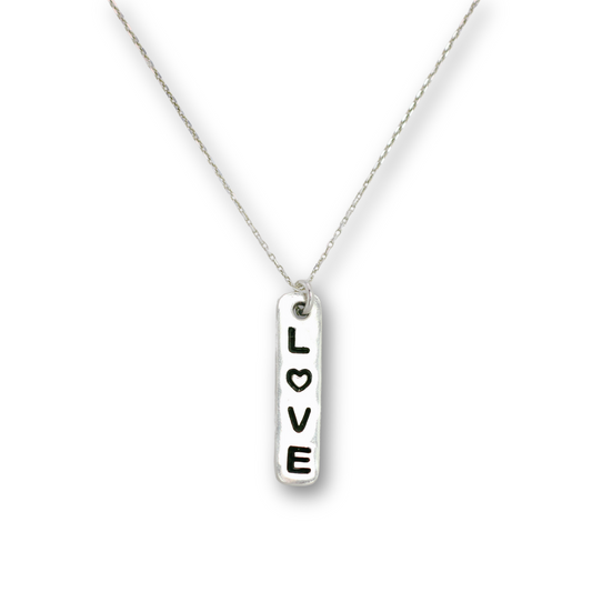 Handcrafted recycled fine silver "love" word charm necklace by Vijara jewelry.