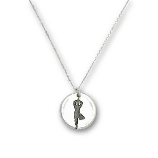 Handcrafted recycled fine silver yoga tree pose charm necklace by Vijara jewelry.