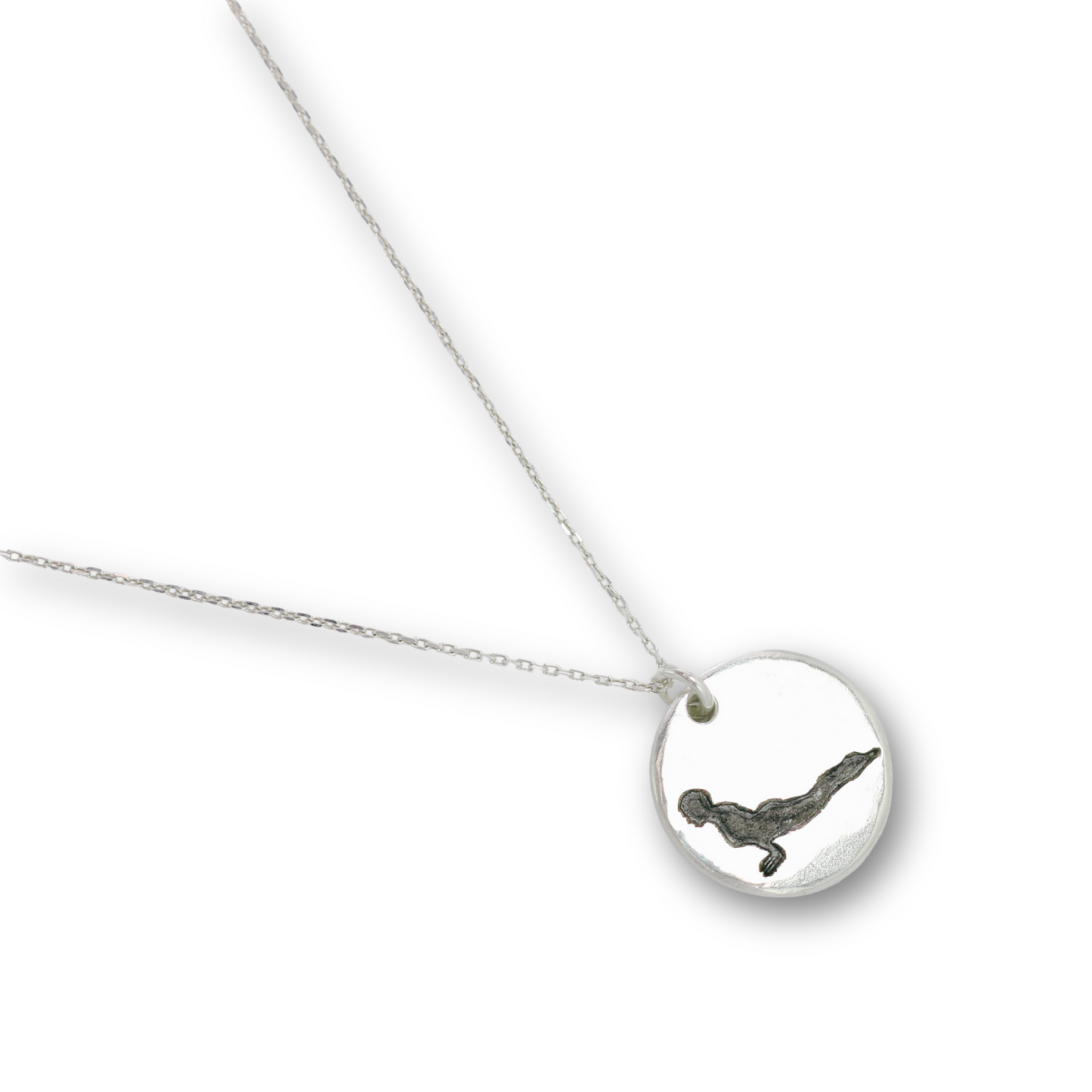 Handcrafted recycled fine silver yoga cobra pose charm necklace by Vijara jewelry.