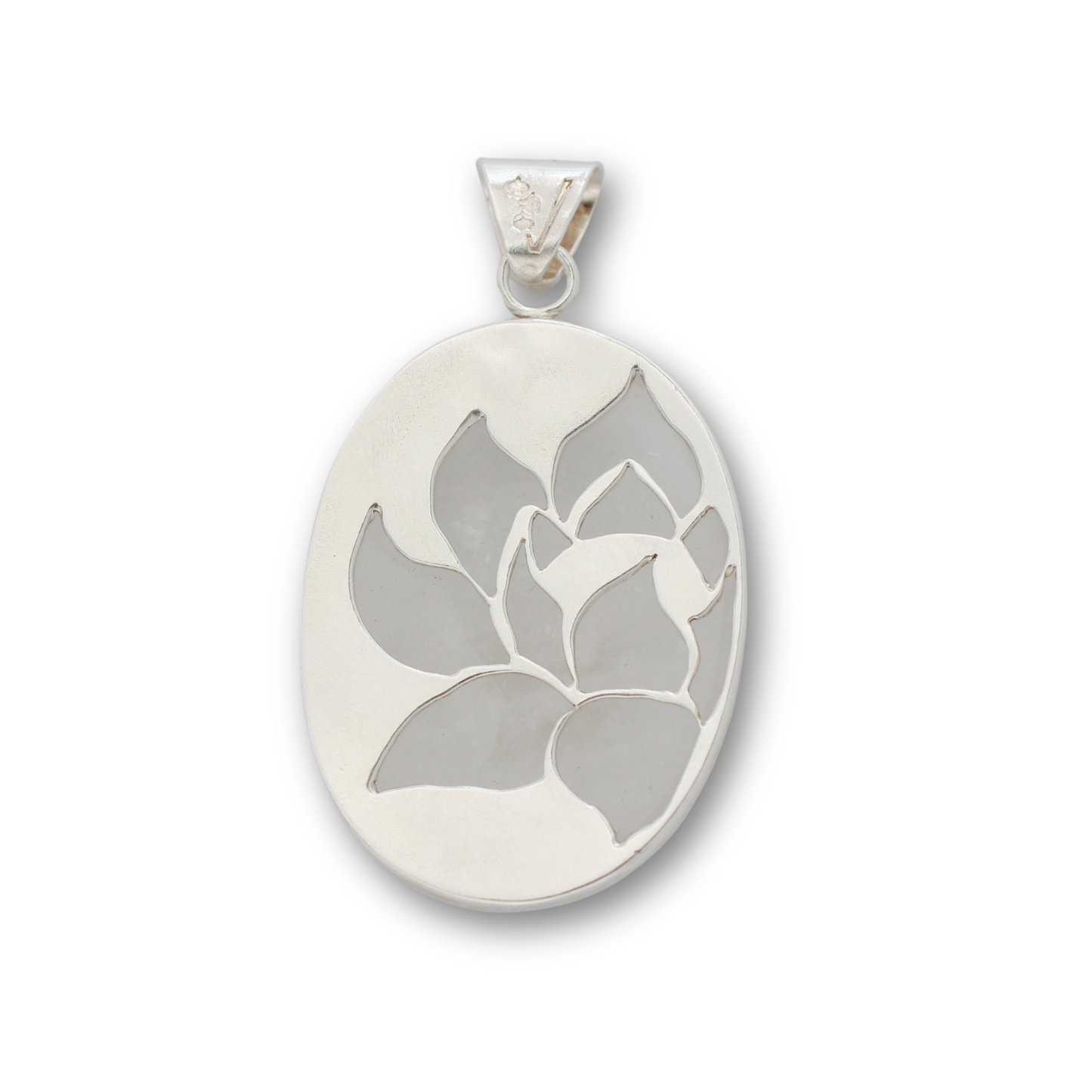 Handcrafted sterling silver and clear quartz lotus flower pendant by Vijara jewelry.