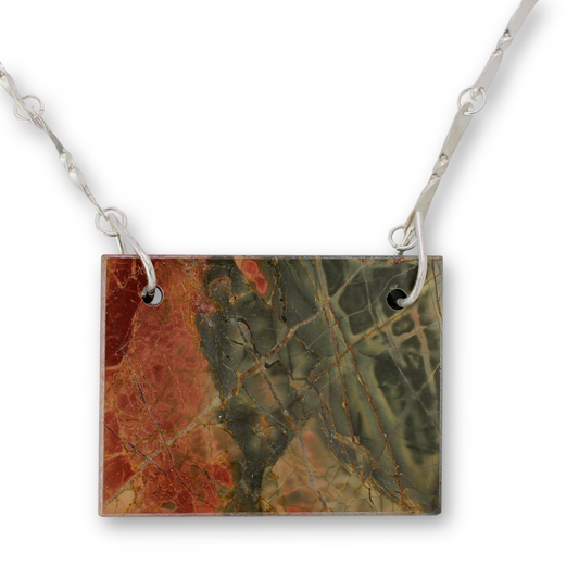 Handcrafted sterling silver chain with natural Red Creek jasper slice centerpiece by Vijara jewelry.
