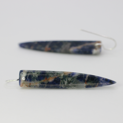 Orange sodalite spike earrings